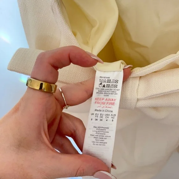 PrettyLittleThing CREAM TWILL CUT OUT BOW SHIFT DRESS - Picture 11 of 11